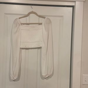 Revolve: Poesia Top in White
Camila Coelho